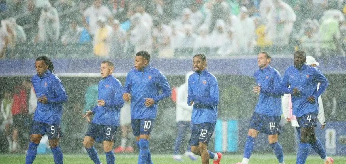 A Sudden Storm Halts the Action