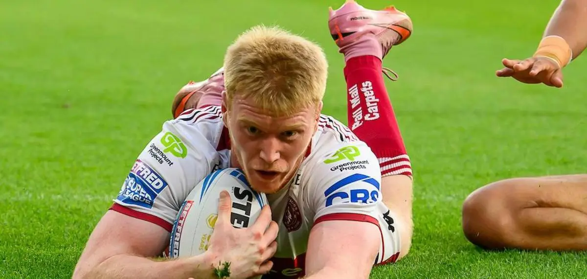 Wigan Warriors Fight Hard to Beat Huddersfield Giants